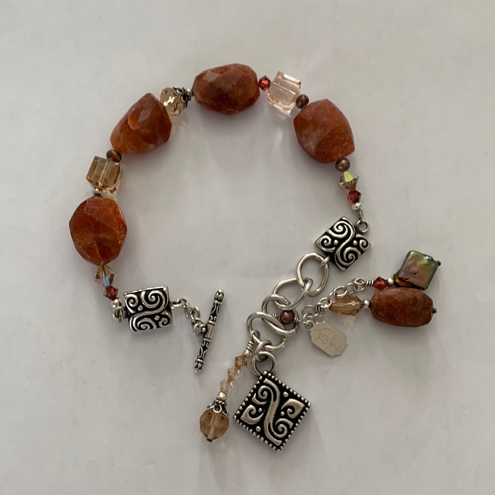 Tres Jolie Cocoa Brown Stones and Scroll Silver Bracelet  with Toggle clasp.